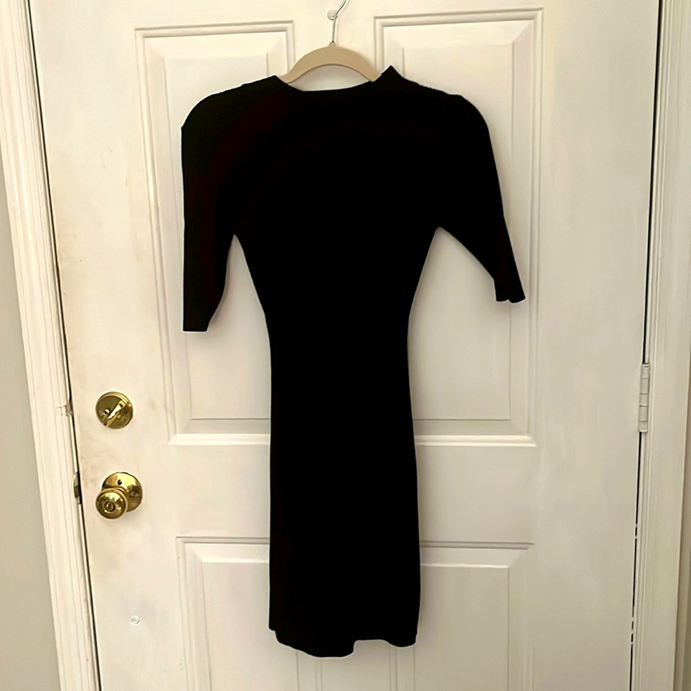 Black bodycon sweater dress .  Size L